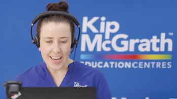 Kip Mcgrath online tutoring - Tutor infront of computer with headset